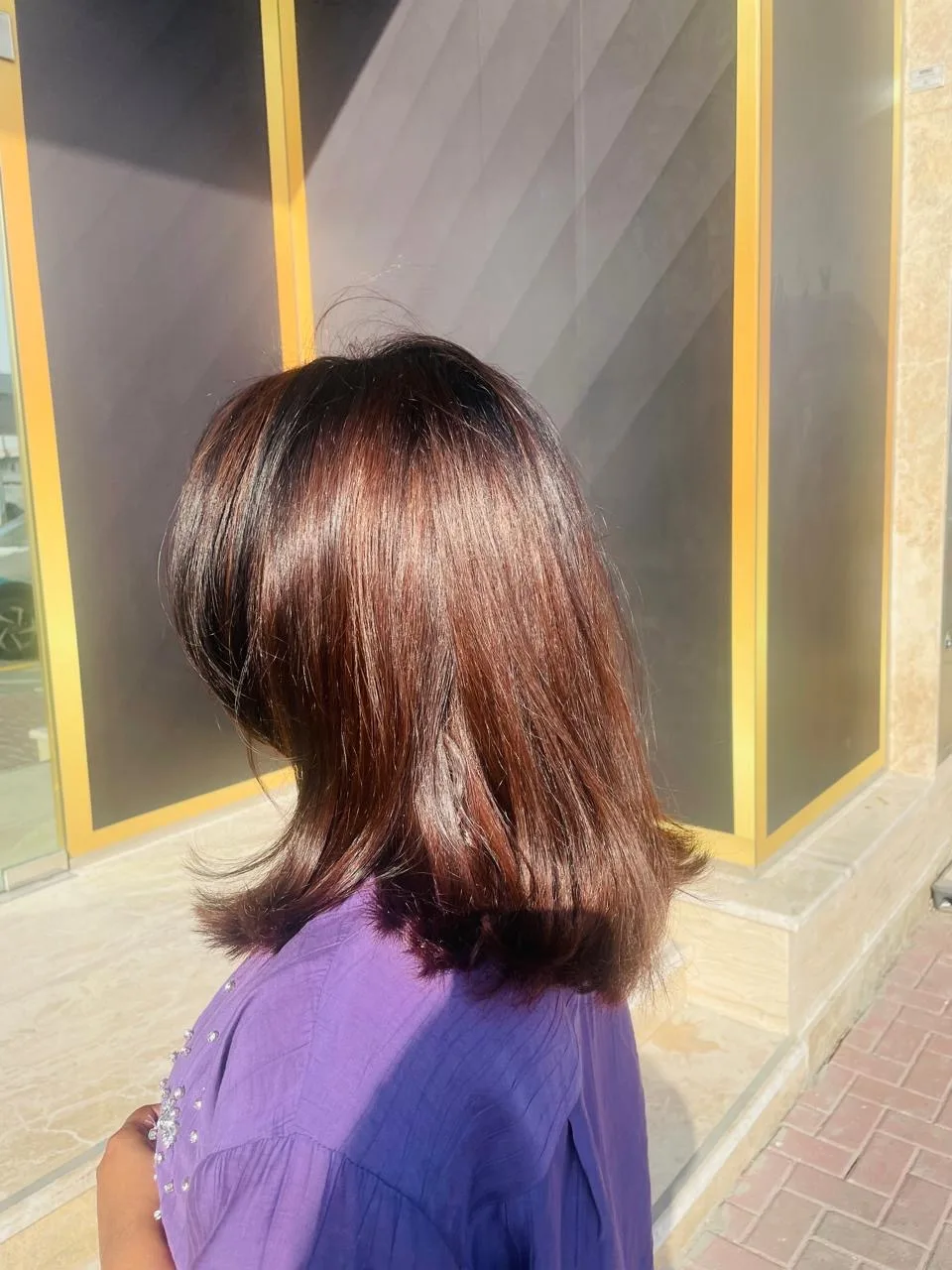 Glossy layered bob with subtle colour