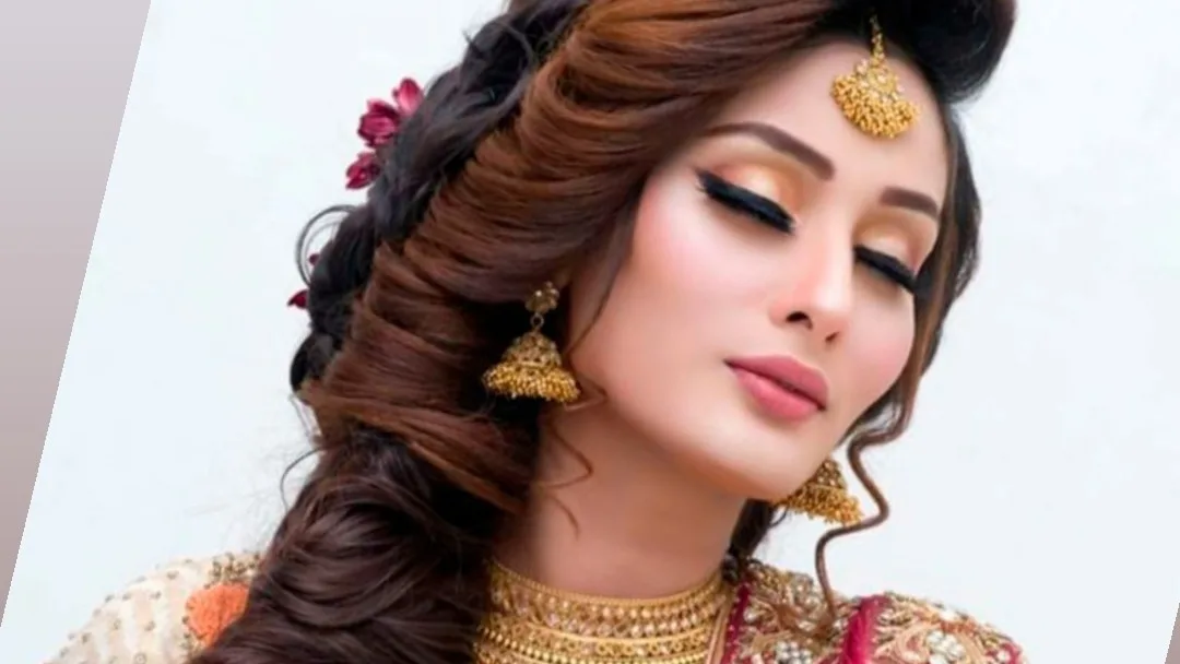 Bridal makeup and styled hair with gold jewellery