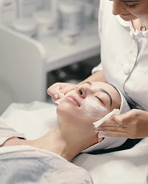 Facial treatment being applied