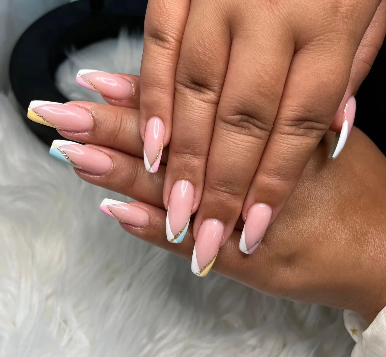 Pastel French-tip nail set finished at Mashael Beauty Lounge