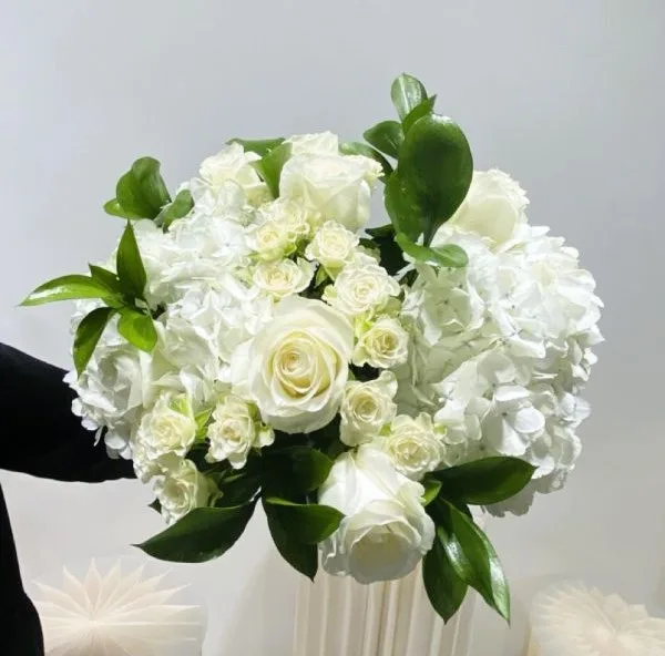 White and pink bouquet in soft wrapping