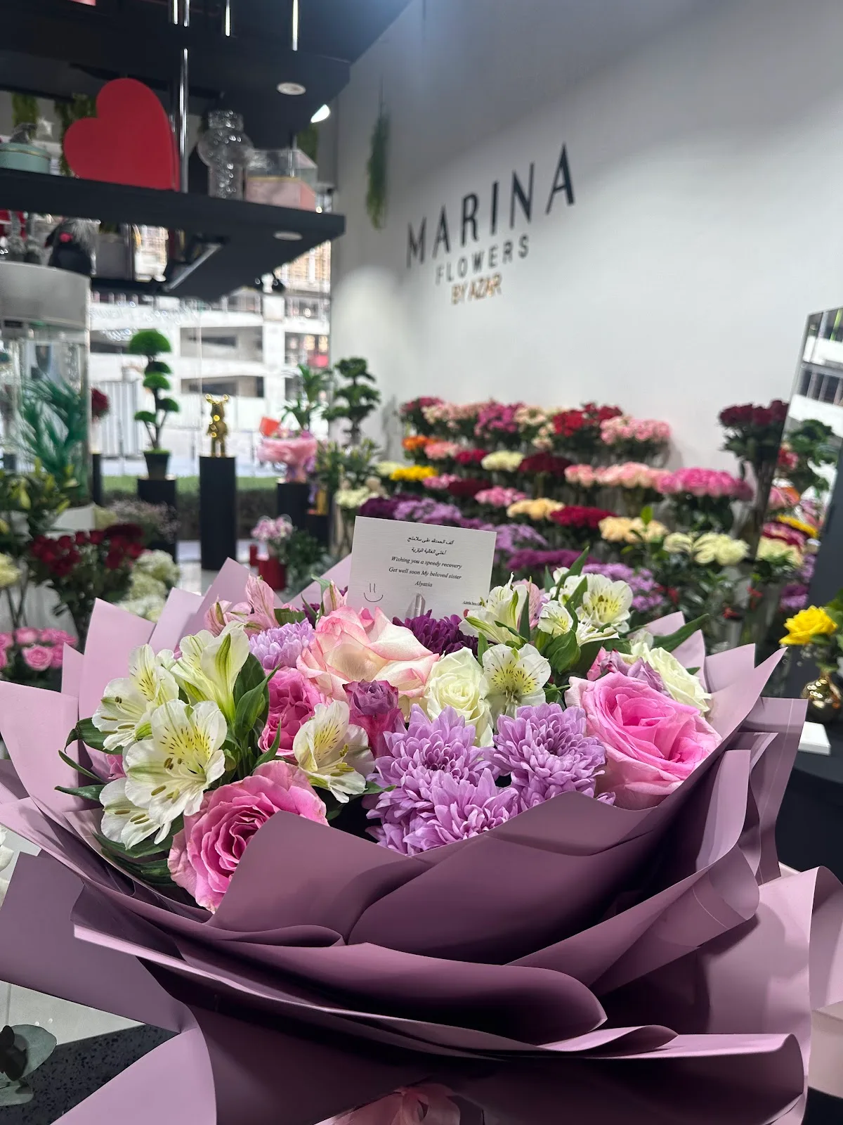 A basket of pink and white roses from above