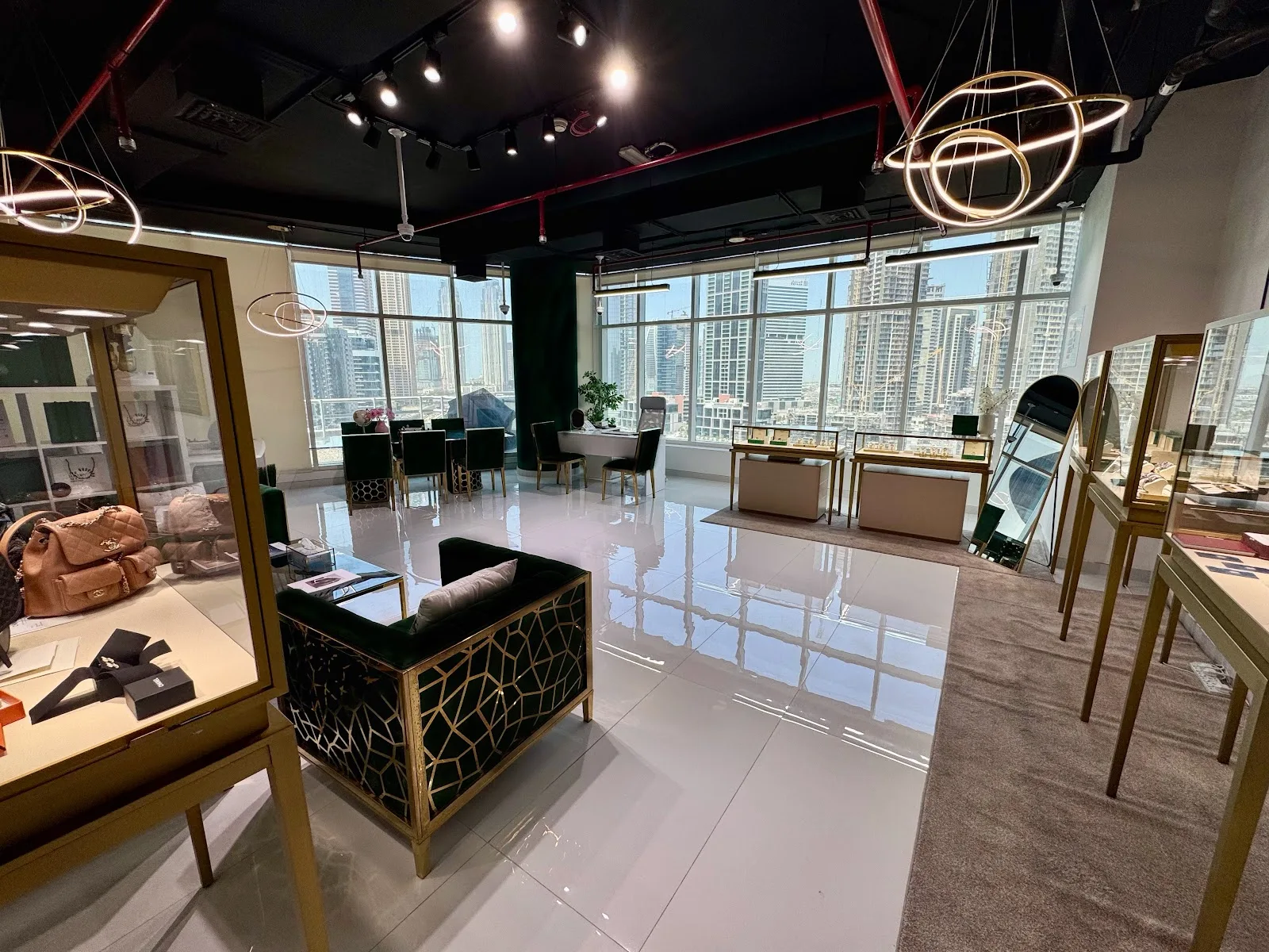 A seating area and display cabinets within the Business Bay showroom