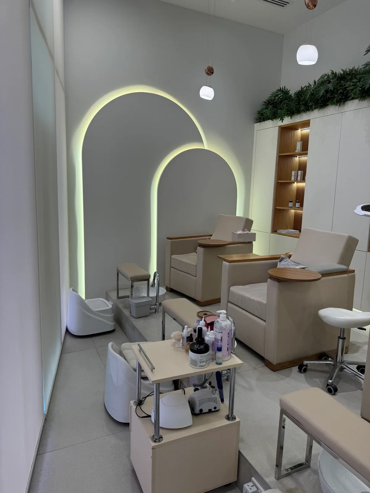 Arch-lit pedicure lounge