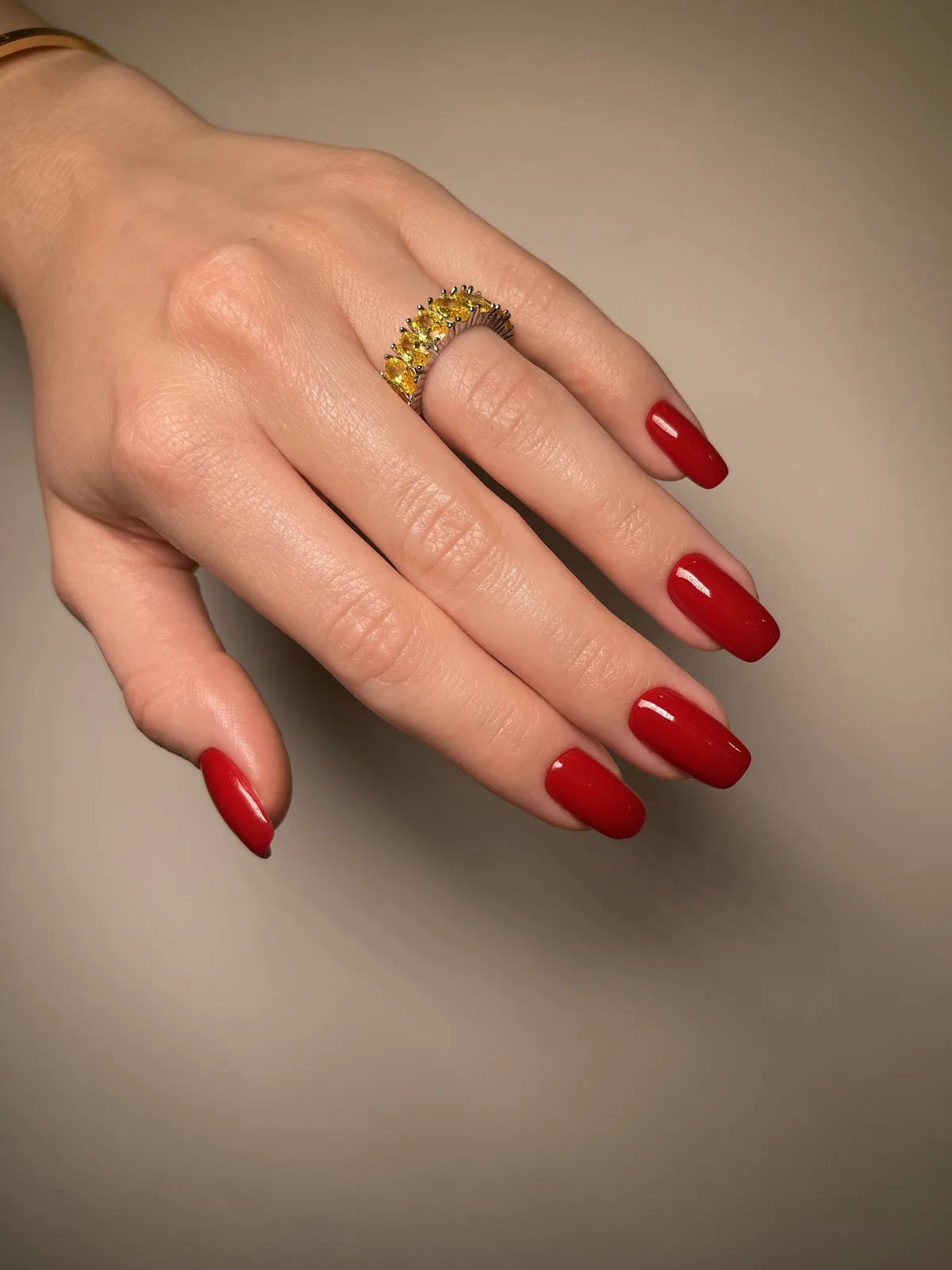 Glossy red manicure