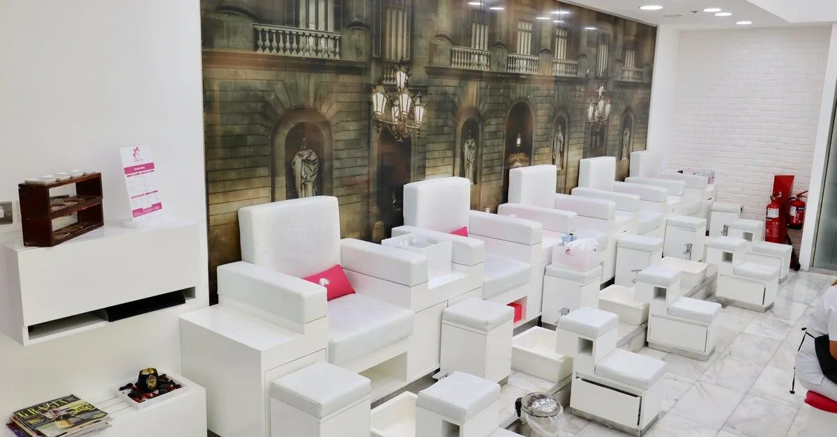 Interior of Miss Cutting Edge Ladies salon with rows of pedicure stations