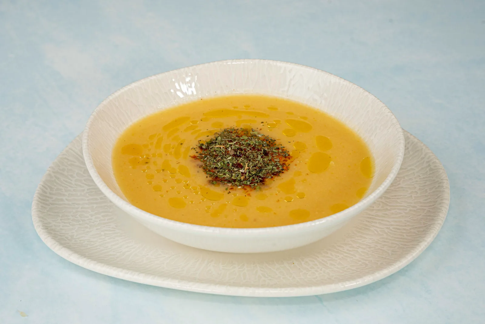Mercimek çorbası — red lentil soup with olive oil and mint