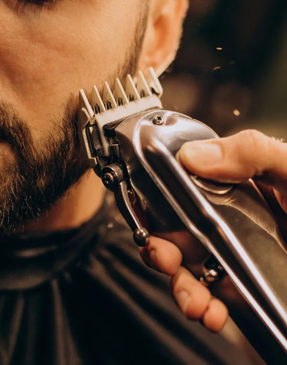 Close-up of beard line-up with clippers