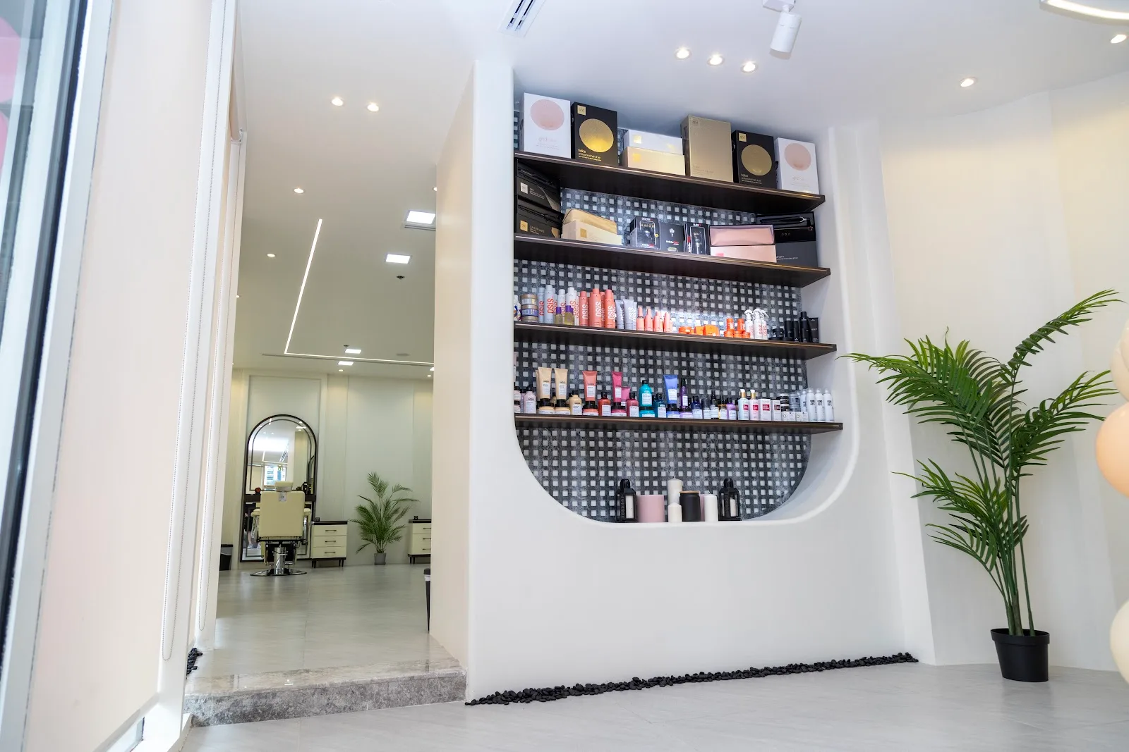 Salon retail wall displaying professional hair and beauty products