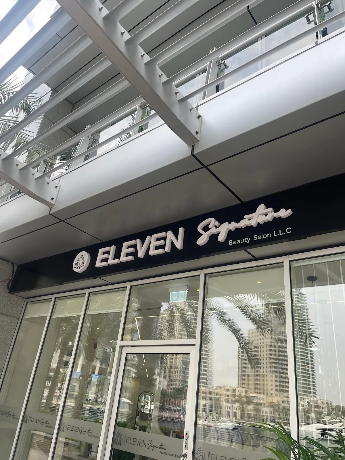 Eleven Signature storefront and signage on Dubai Marina