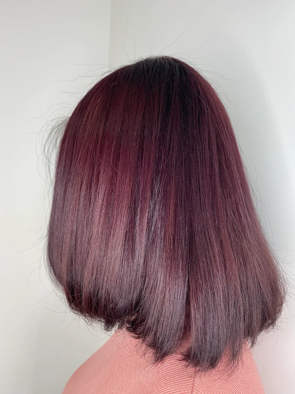 Glossy burgundy bob, back view