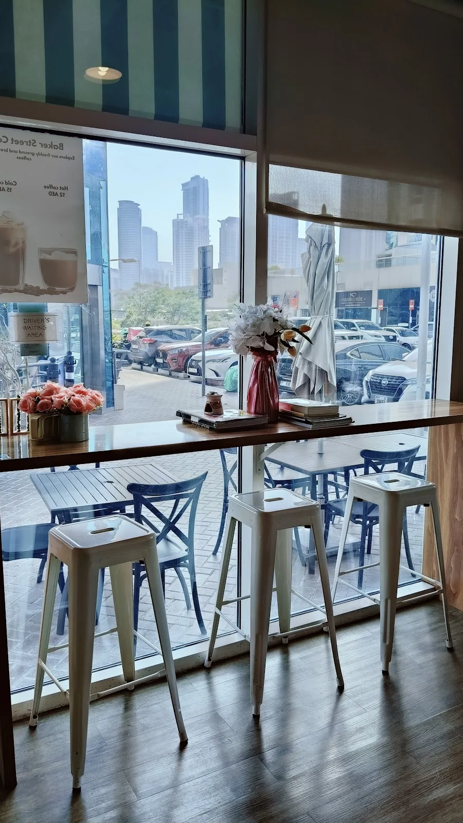 Window counter seating looking out to the JLT towers