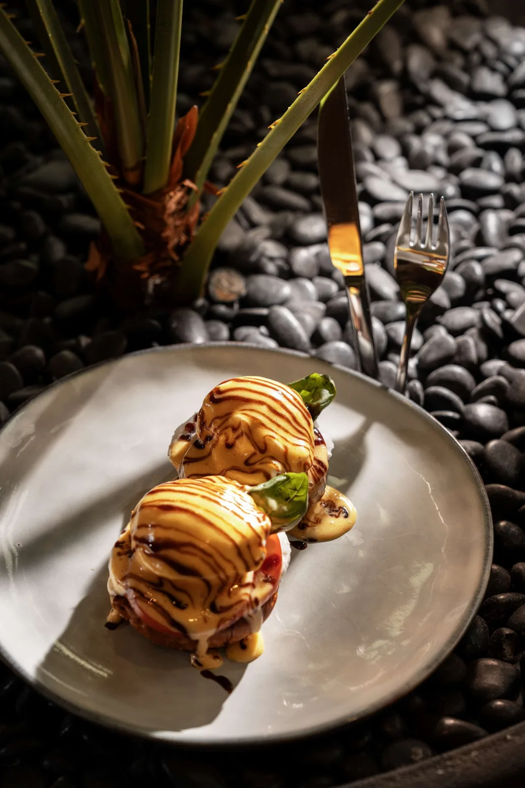 Eggs benedict on a styled plate