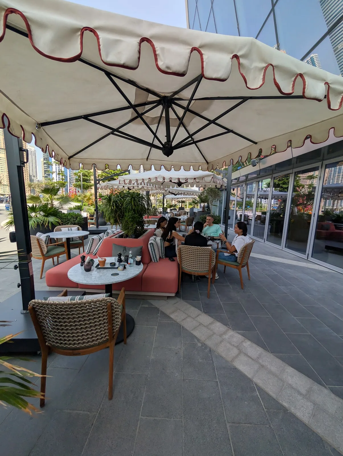 Scalloped umbrellas over the outdoor terrace
