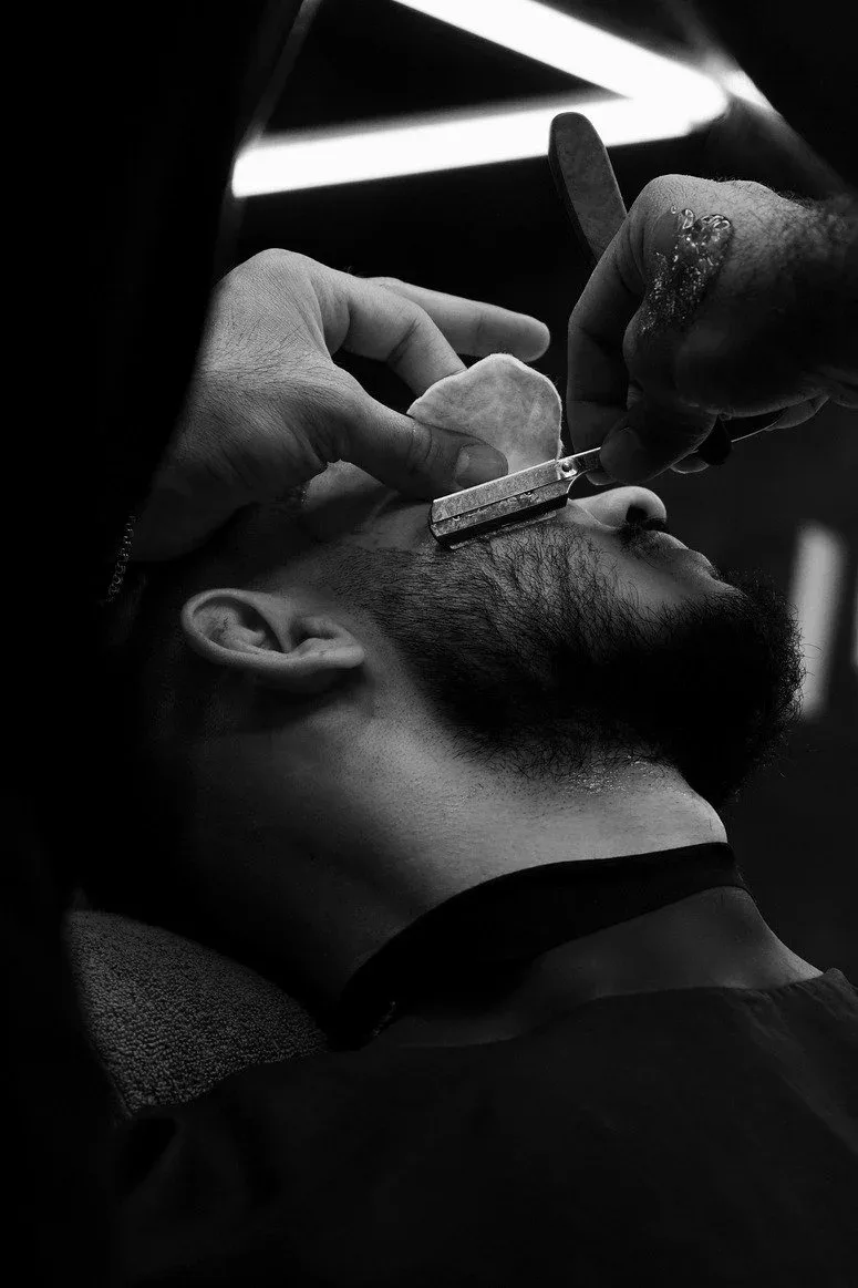Straight razor beard shave in monochrome
