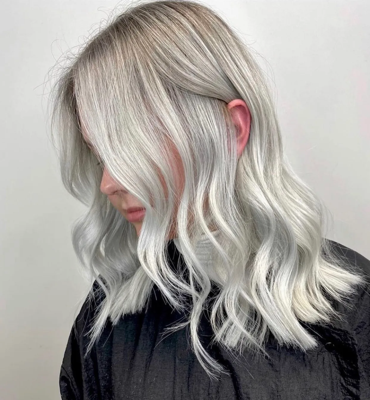 Cool silver-blonde colour result with soft waves