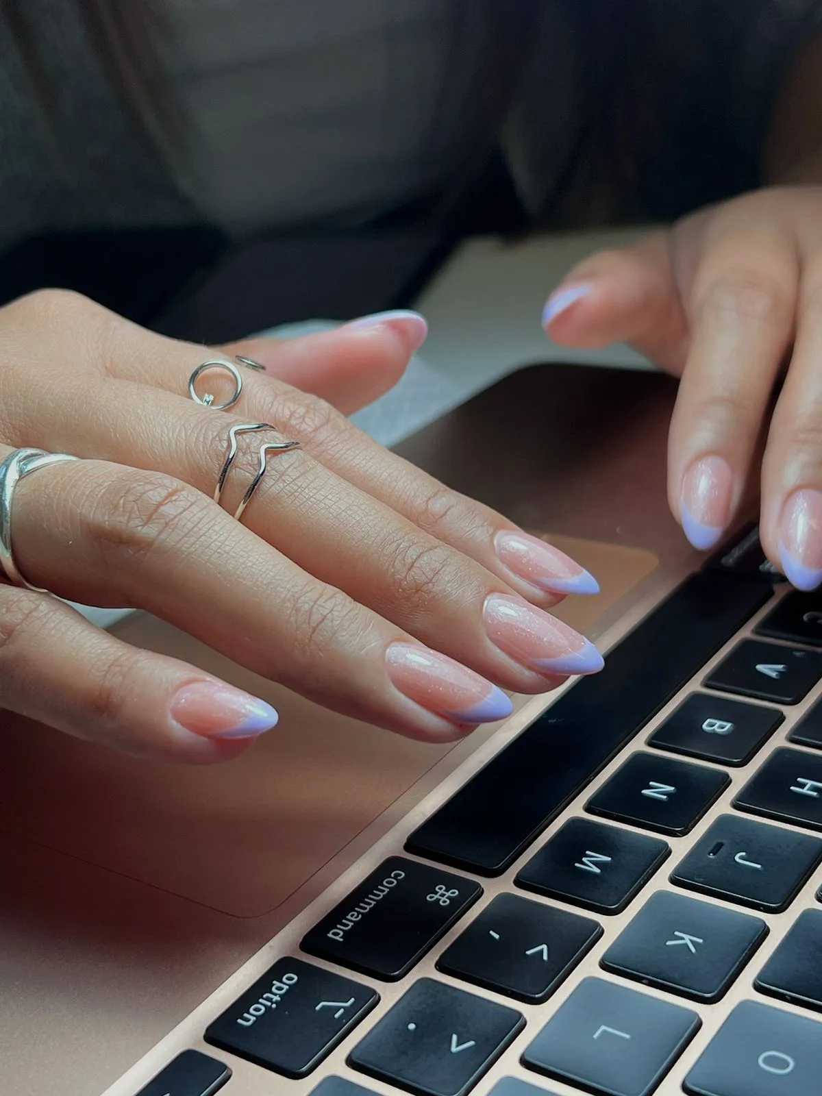 Manicured nails with a soft chrome finish