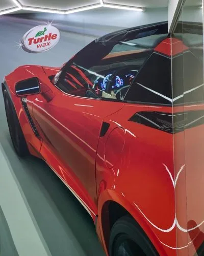 Red sports car detailed in the studio