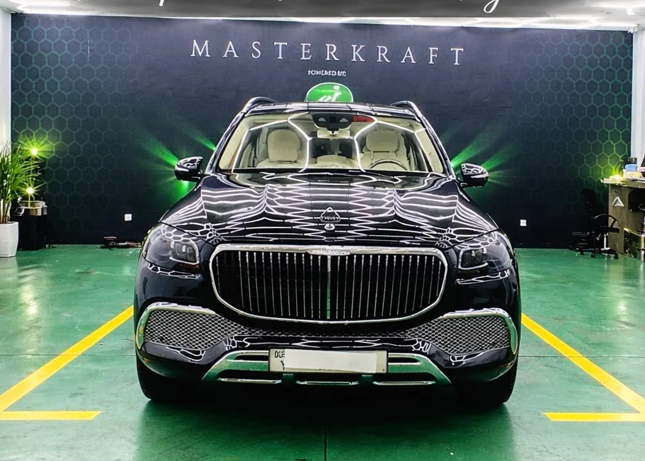 Dark luxury saloon with a high-gloss ceramic finish