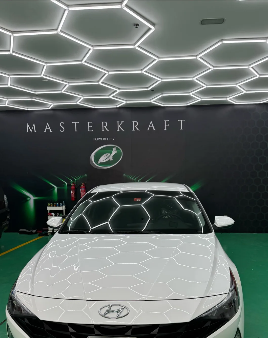 Car paint shown with a dull, hazy finish