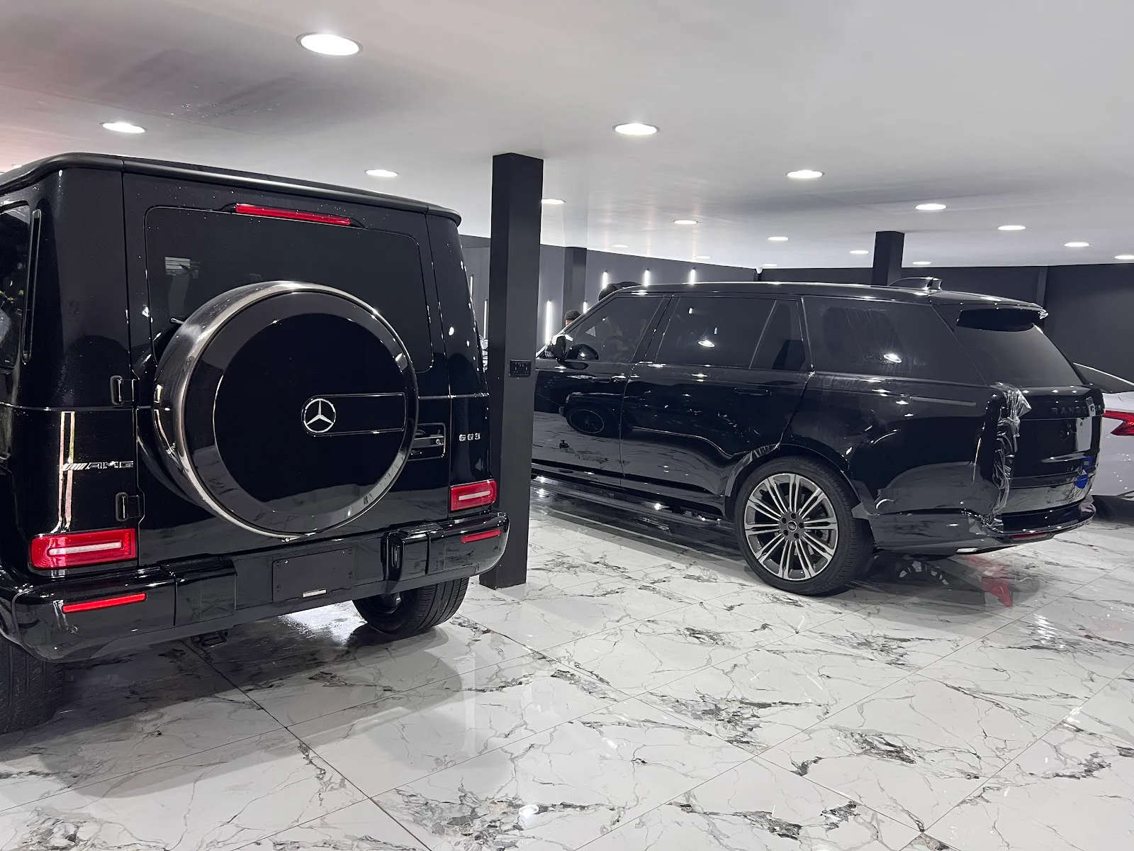 Mercedes-AMG G63 and Range Rover detailed to a mirror gloss
