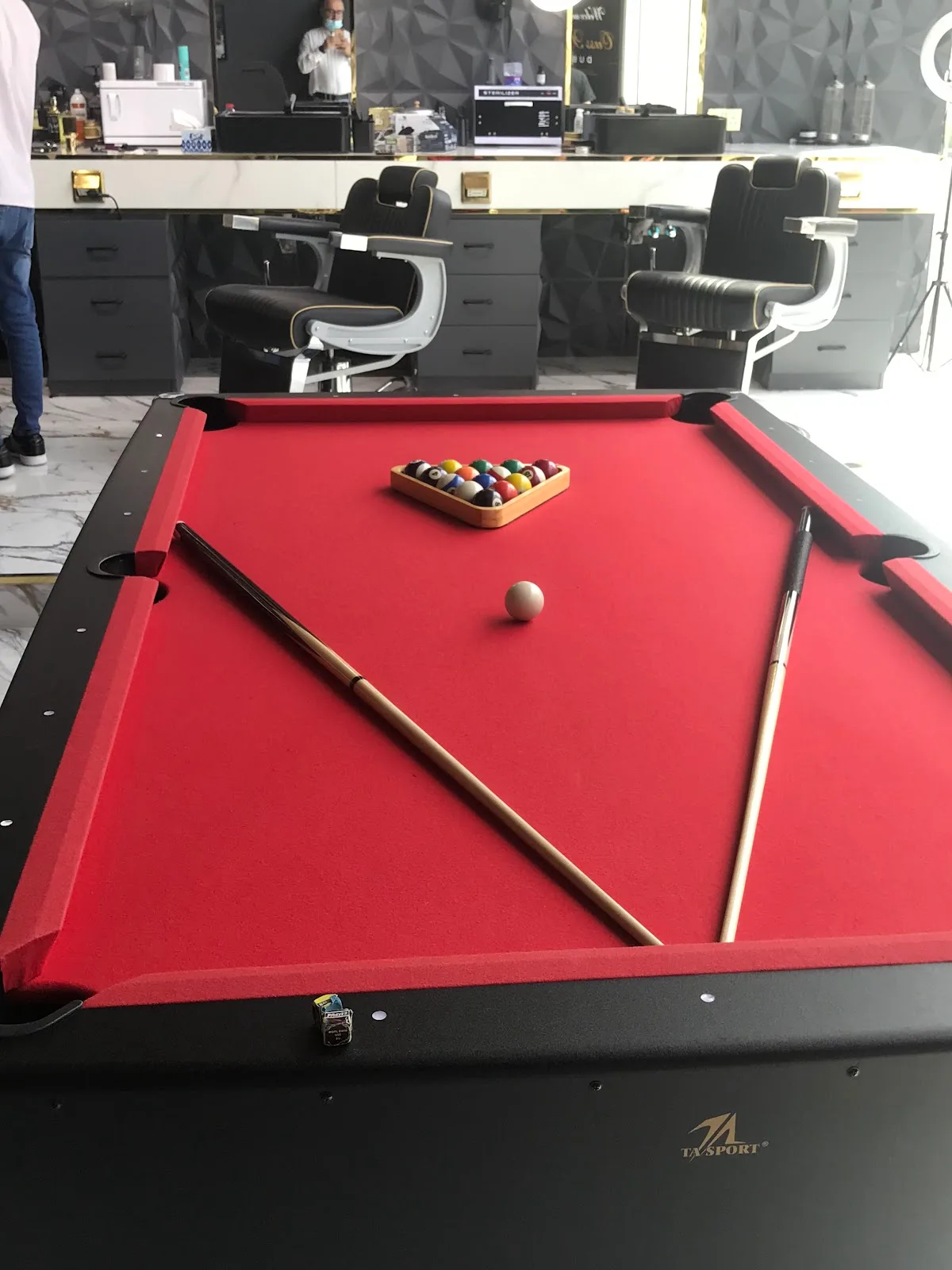 Lounge area with a pool table inside the club