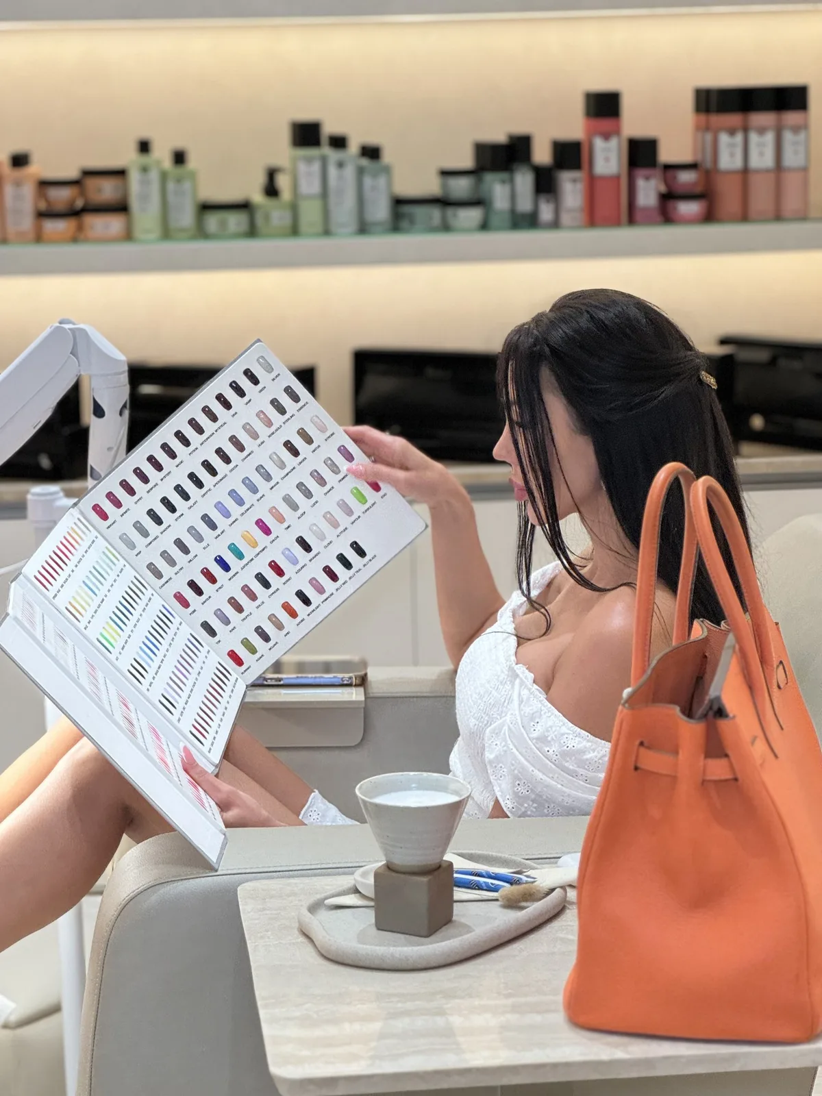 A client browsing the nail colour selection