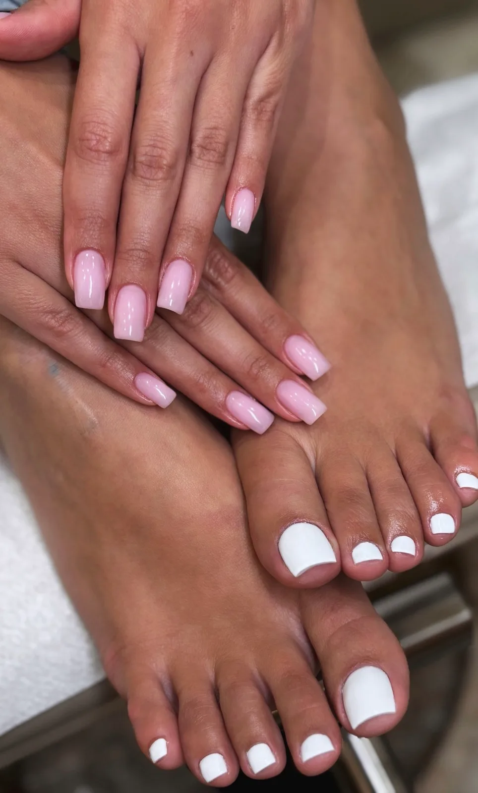 Soft pink manicure and pedicure