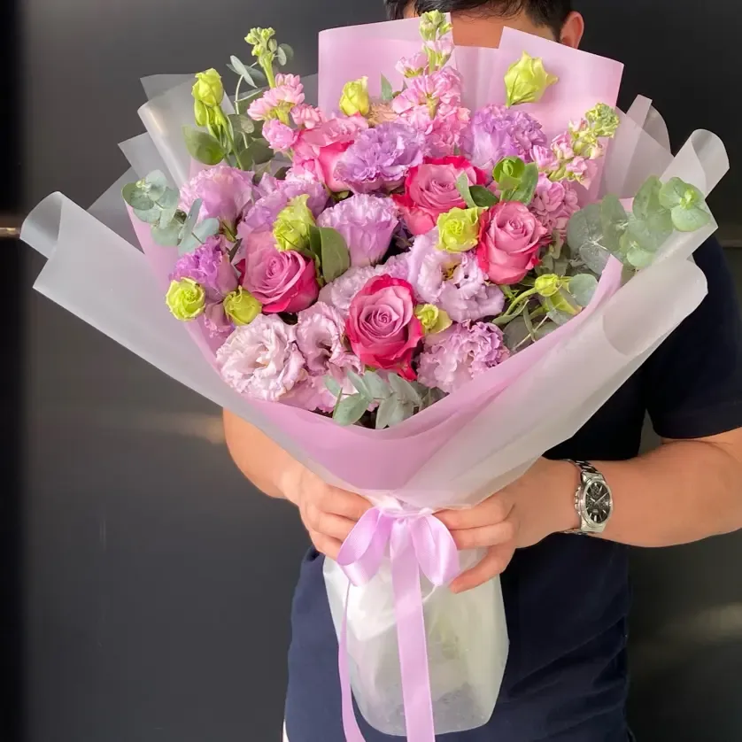 Purple and pink bouquet with eucalyptus