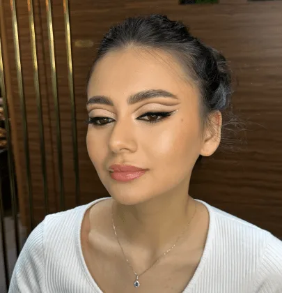 Polished evening makeup with sleek updo