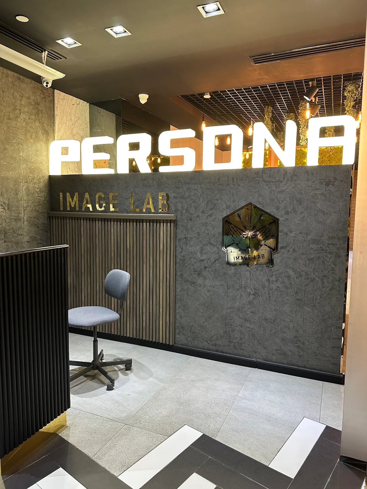 PERSONA Image Lab reception and signage