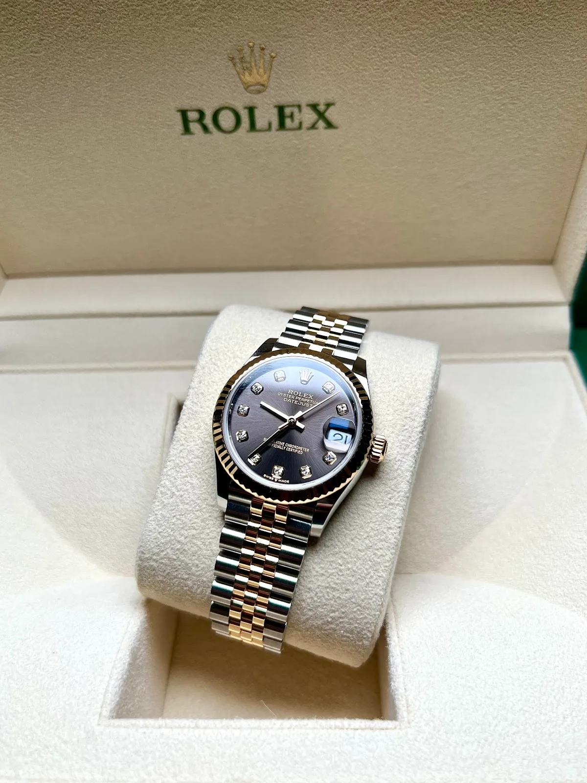 Two-tone Rolex Datejust with a diamond-marker dial in its presentation box
