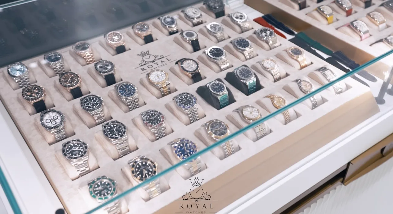 A presentation tray lined with Rolex sports and dress watches