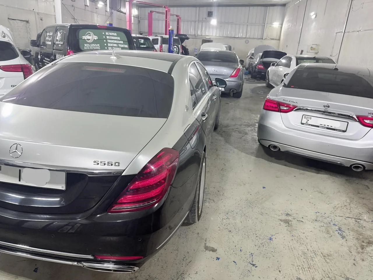 Mercedes-Benz S-Class parked inside the workshop bay