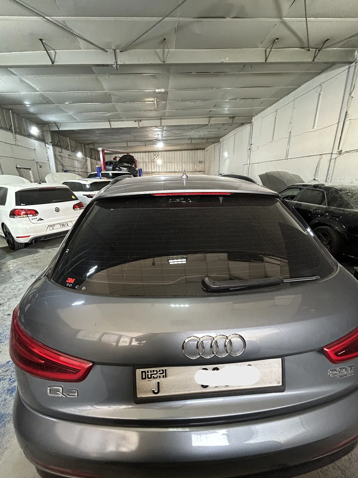 Grey Audi Q3 parked in the workshop