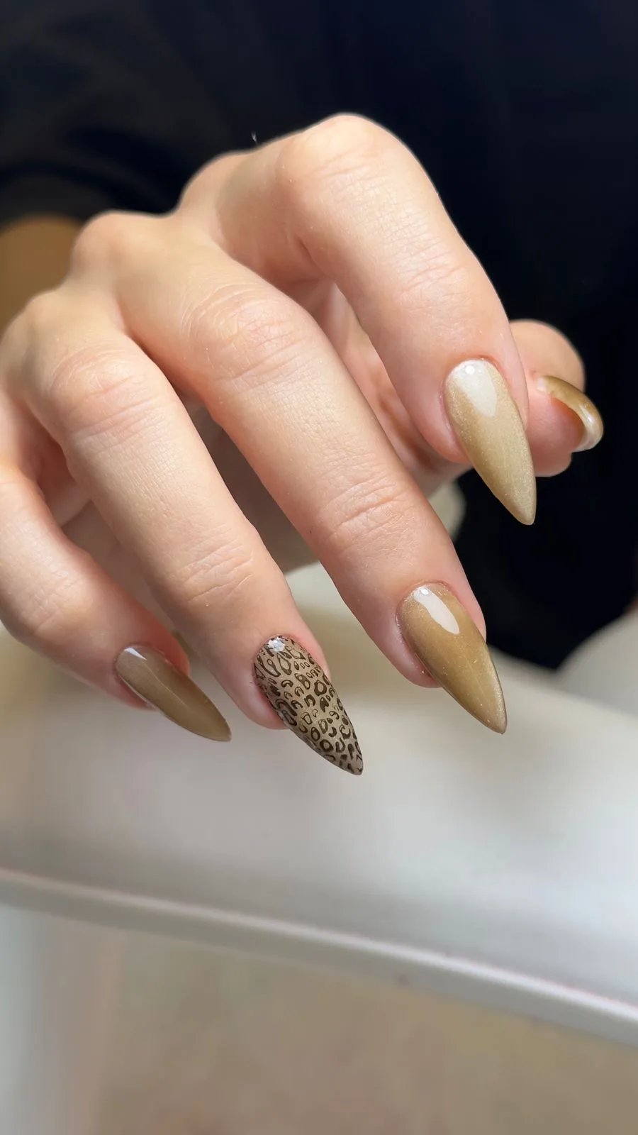 Nude nails with leopard accent