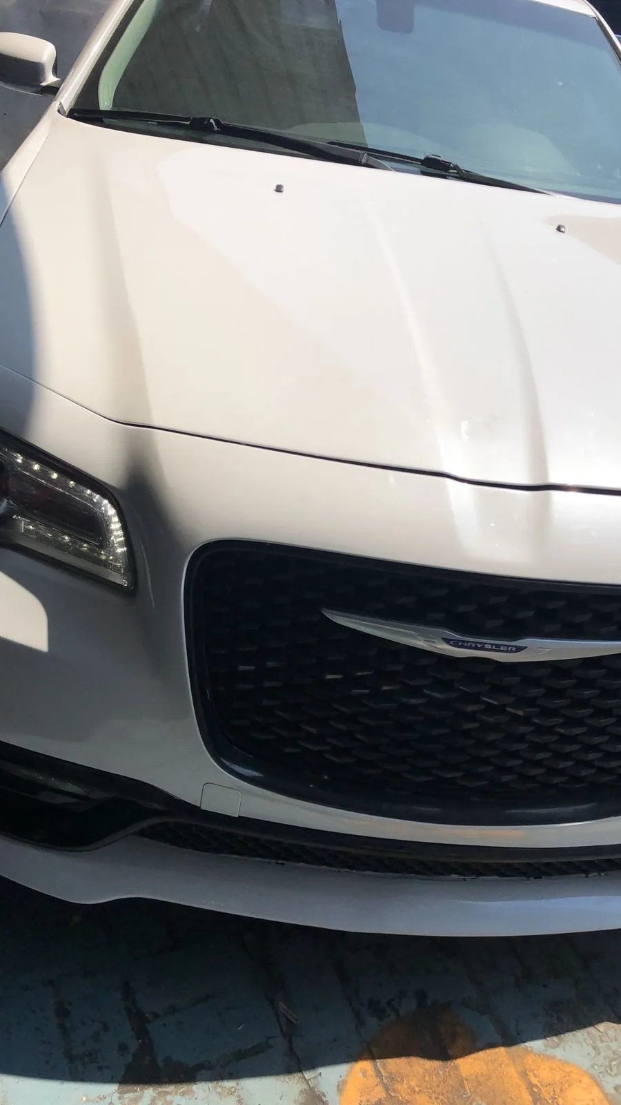 Front of a car in the workshop for service