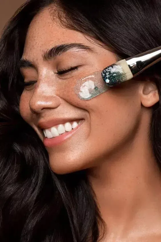 A relaxed client receiving a facial treatment