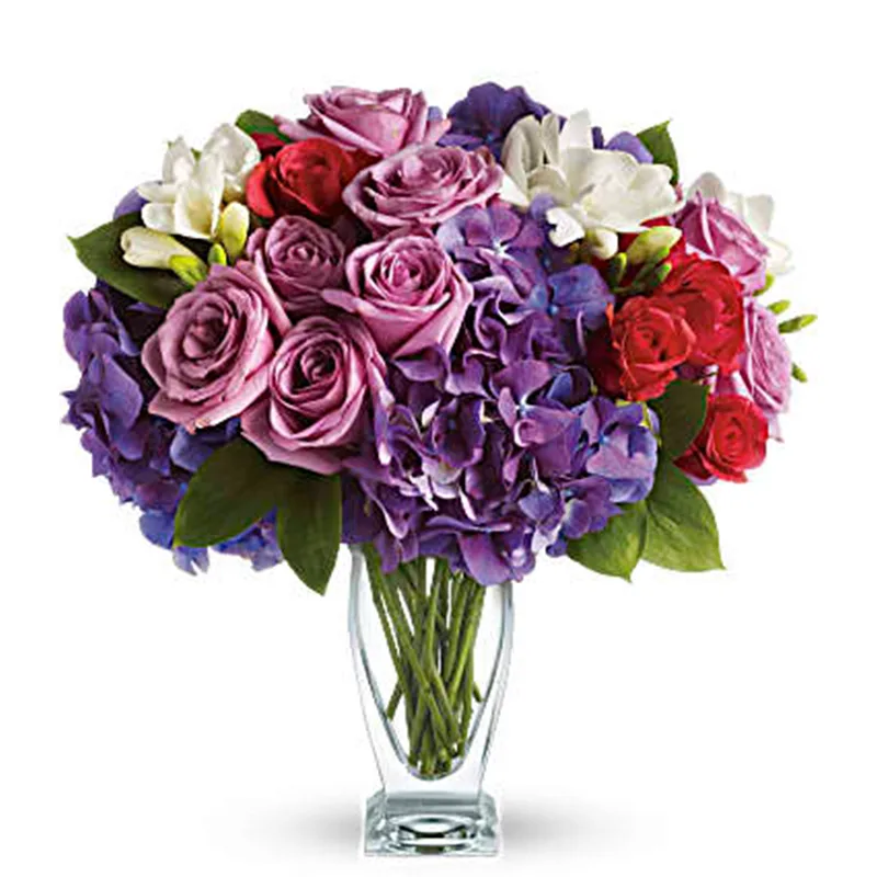 Lavender roses, hydrangea and freesia in a vase