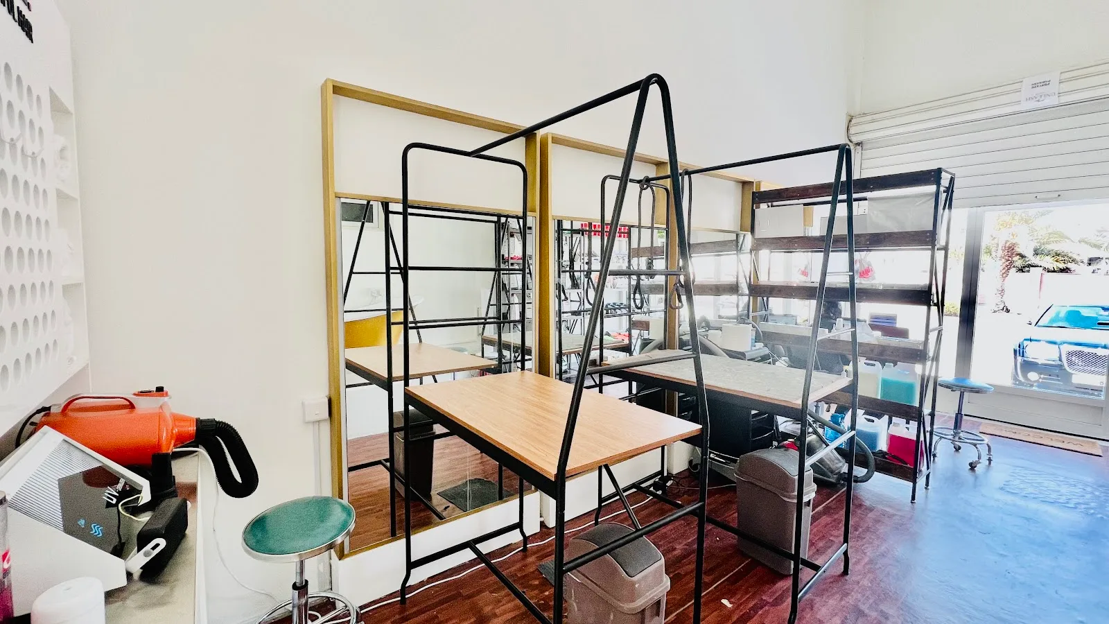 Grooming room with tables and dryers
