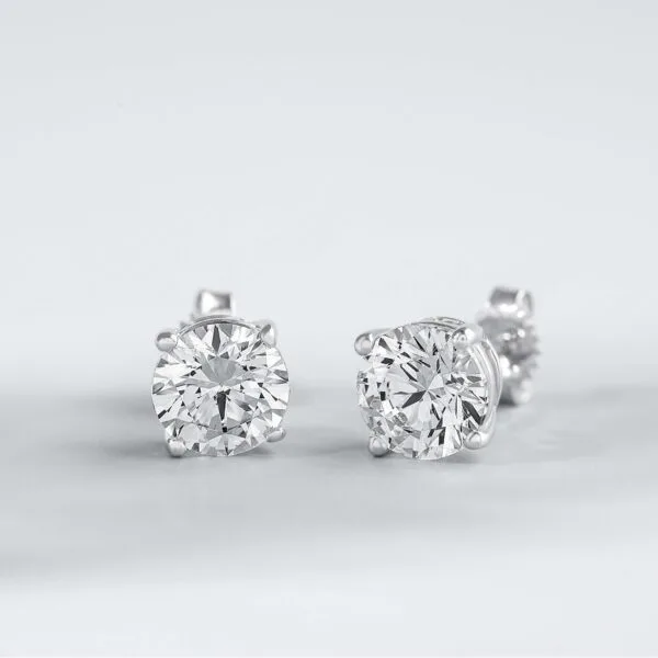 Pair of round diamond stud earrings