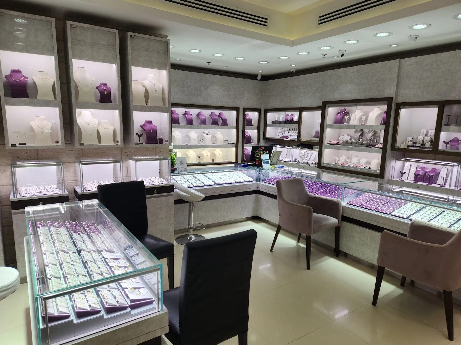 Inside the Beladamaz showroom with lit display cases