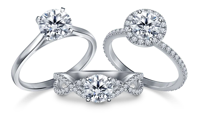 Three white gold diamond rings — solitaire, halo and twisted band