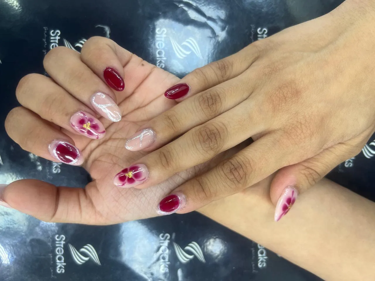 Hand-painted floral nail art