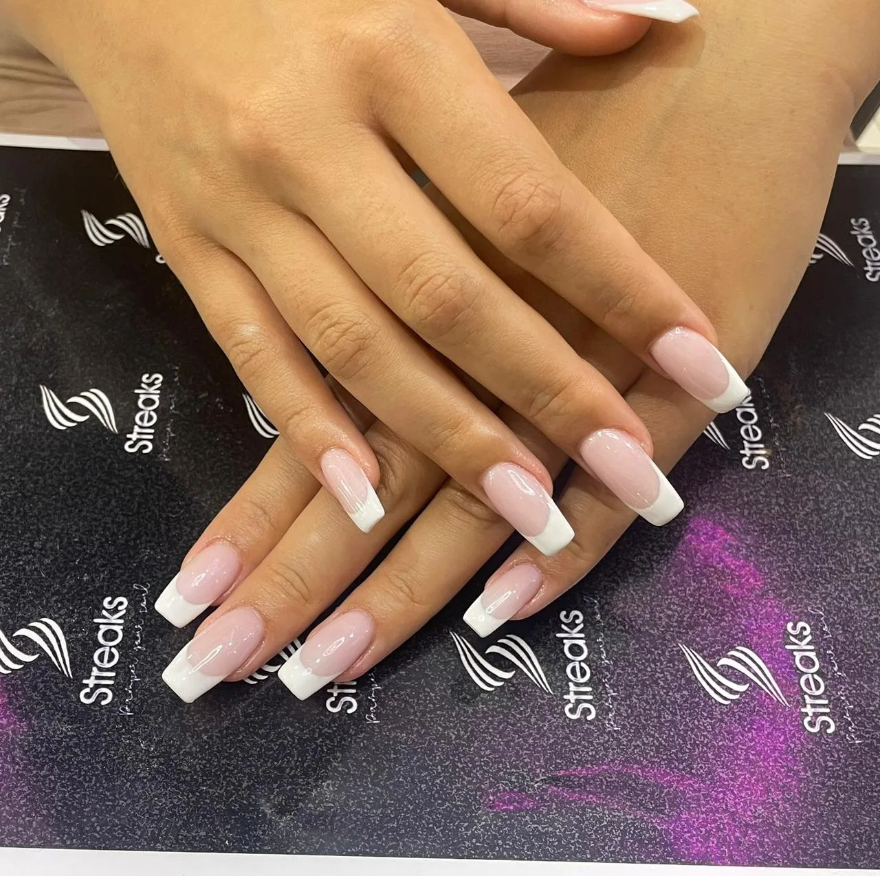 Long French-tip nails