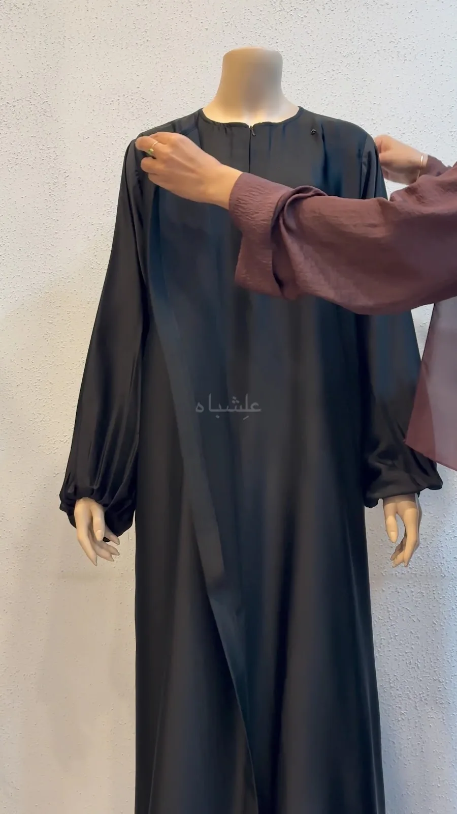Black abaya and shayla with graduated crystal stonework along the hem and cuffs
