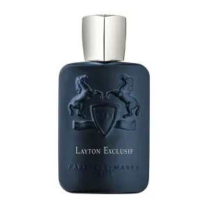 A deep navy niche fragrance bottle