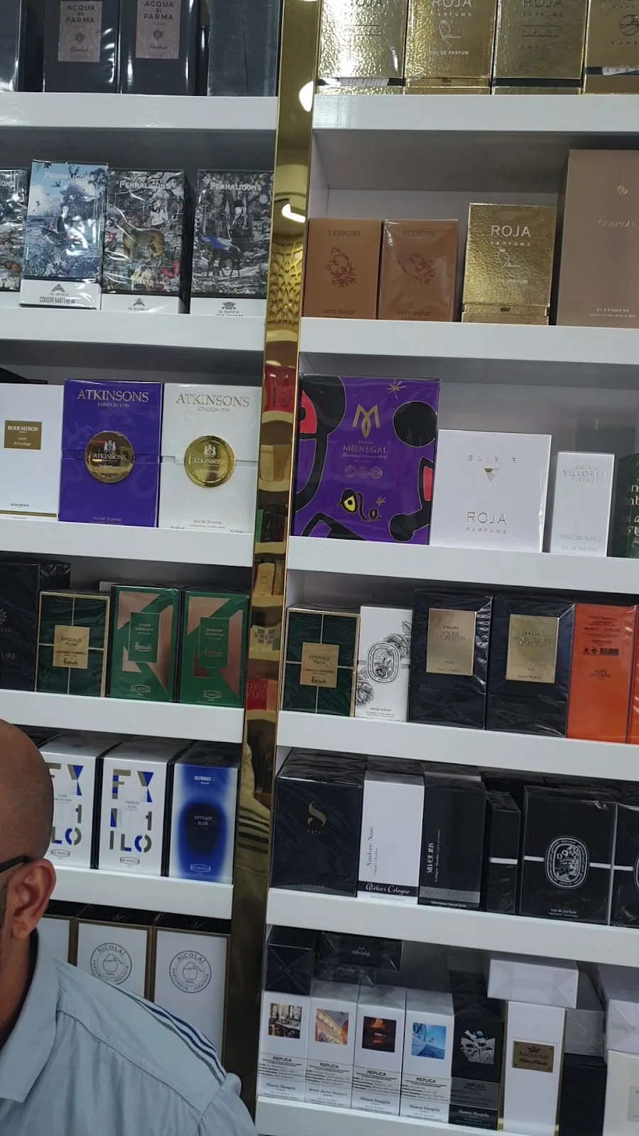Shelves of niche fragrance boxes