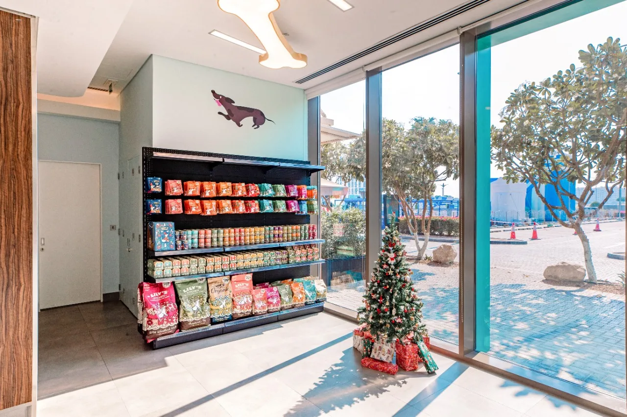 Shelves of pet food, treats and accessories at the Petsville pet shop