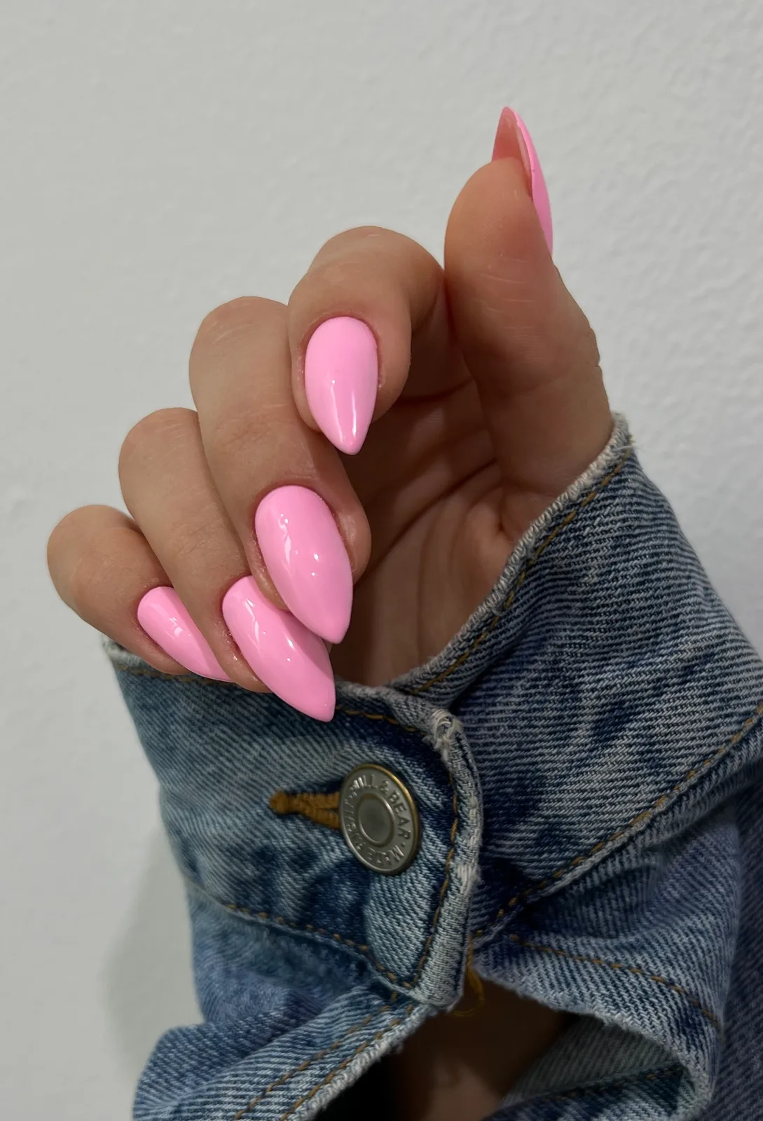 Pink stiletto nail extensions